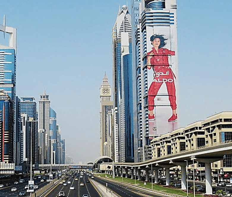 Large-scale outdoor building facade branding campaign in a major metropolitan urban corridor