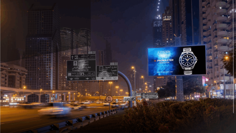 Illuminated outdoor digital billboard campaign on a high-traffic Dubai expressway