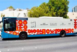 Premium full side bus wrap advertising and public transit vehicle branding in Abu Dhabi UAE