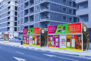 Full wrap static campaign branding on modern RTA air-conditioned bus shelters for premium transit advertising in Dubai