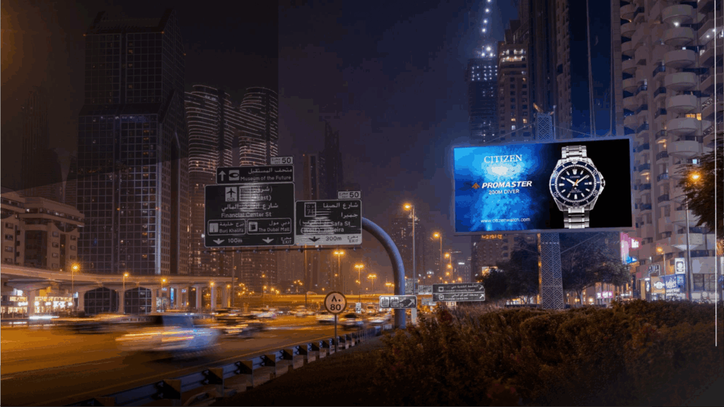 Digital unipole billboard displaying Citizen Promaster watch ad on Dubai highway