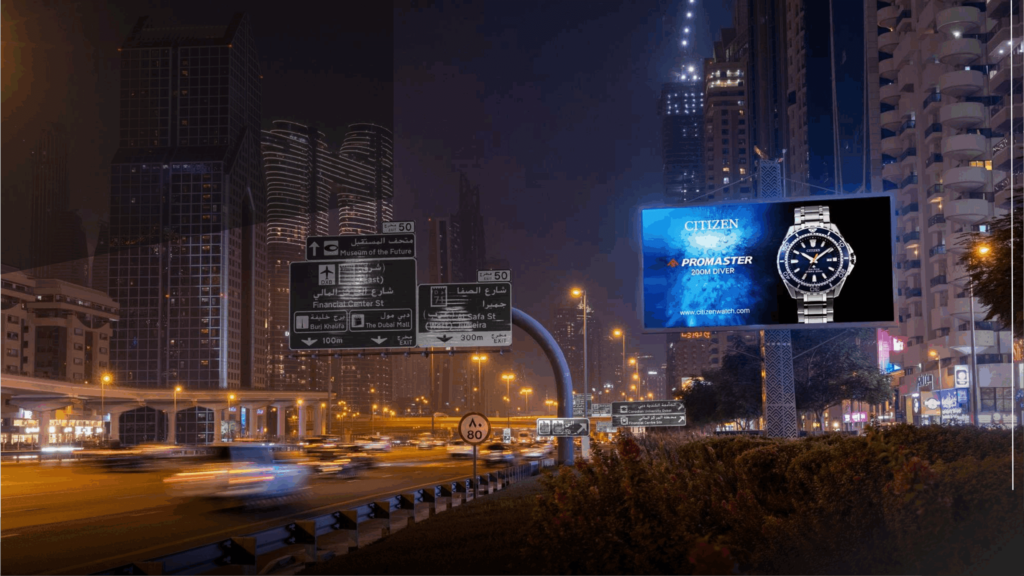 Digital unipole billboard displaying Citizen Promaster watch ad on Dubai highway