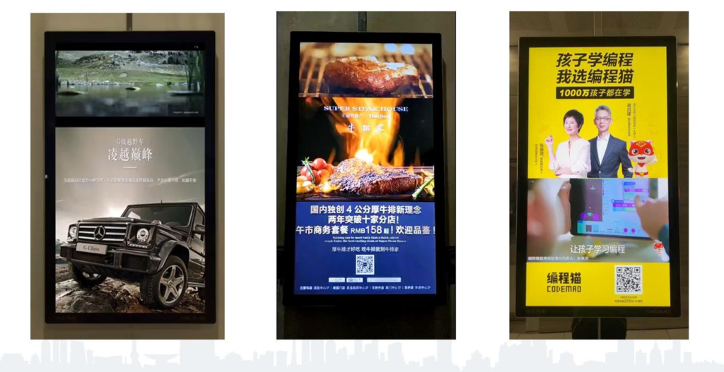 Vertical digital screen displays showcasing various automotive, restaurant, and educational advertising campaigns in an elevator