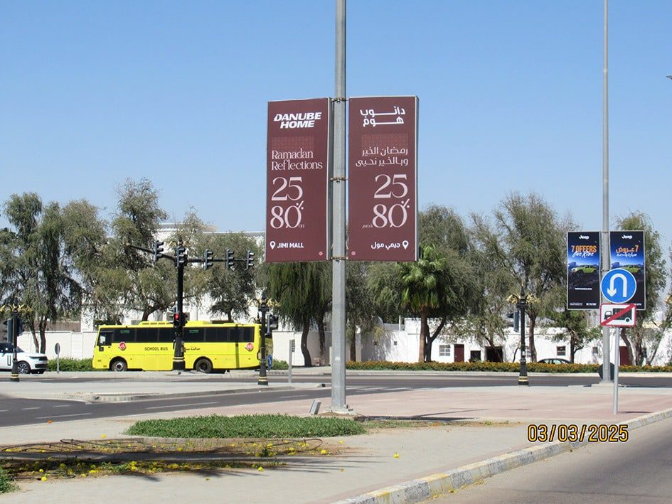 lamppost advertisement in Al Ain