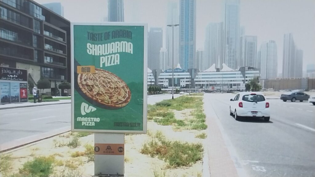 Maestro Pizza Shawarma Pizza billboard advertisement on street side