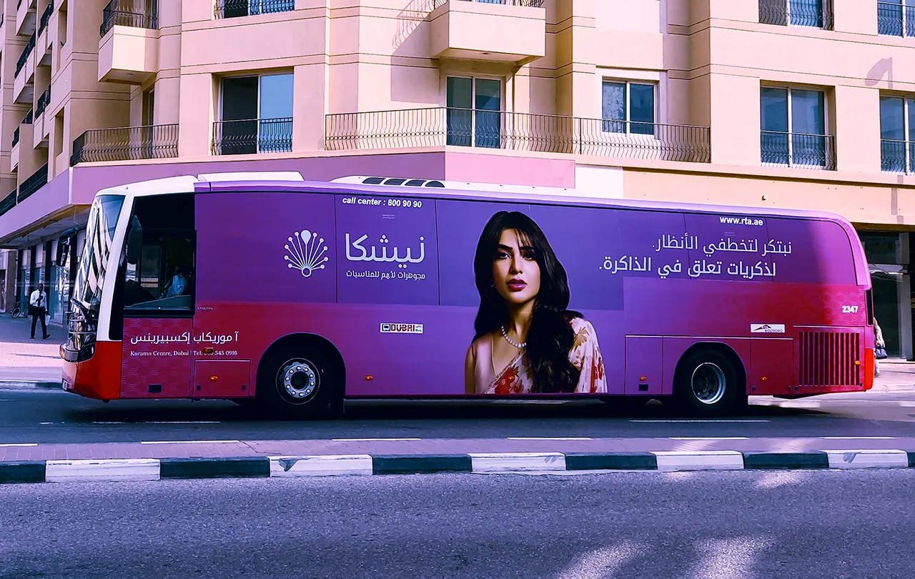 RTA bus wrap advertisement featuring Nysha jewelry in Dubai