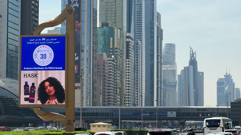 HASK hair care digital OOH advertising display in Dubai city landscape