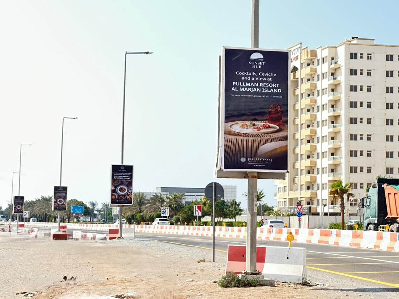 Outdoor lamppost banner advertising campaign for Pullman Resort and Spa at Al Marjan Island in Ras Al Khaimah