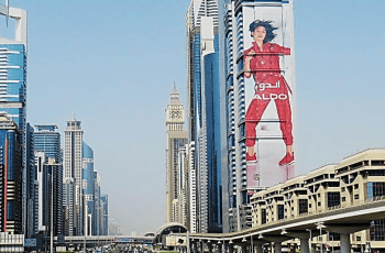Large-scale outdoor building facade branding campaign in a major metropolitan urban corridor